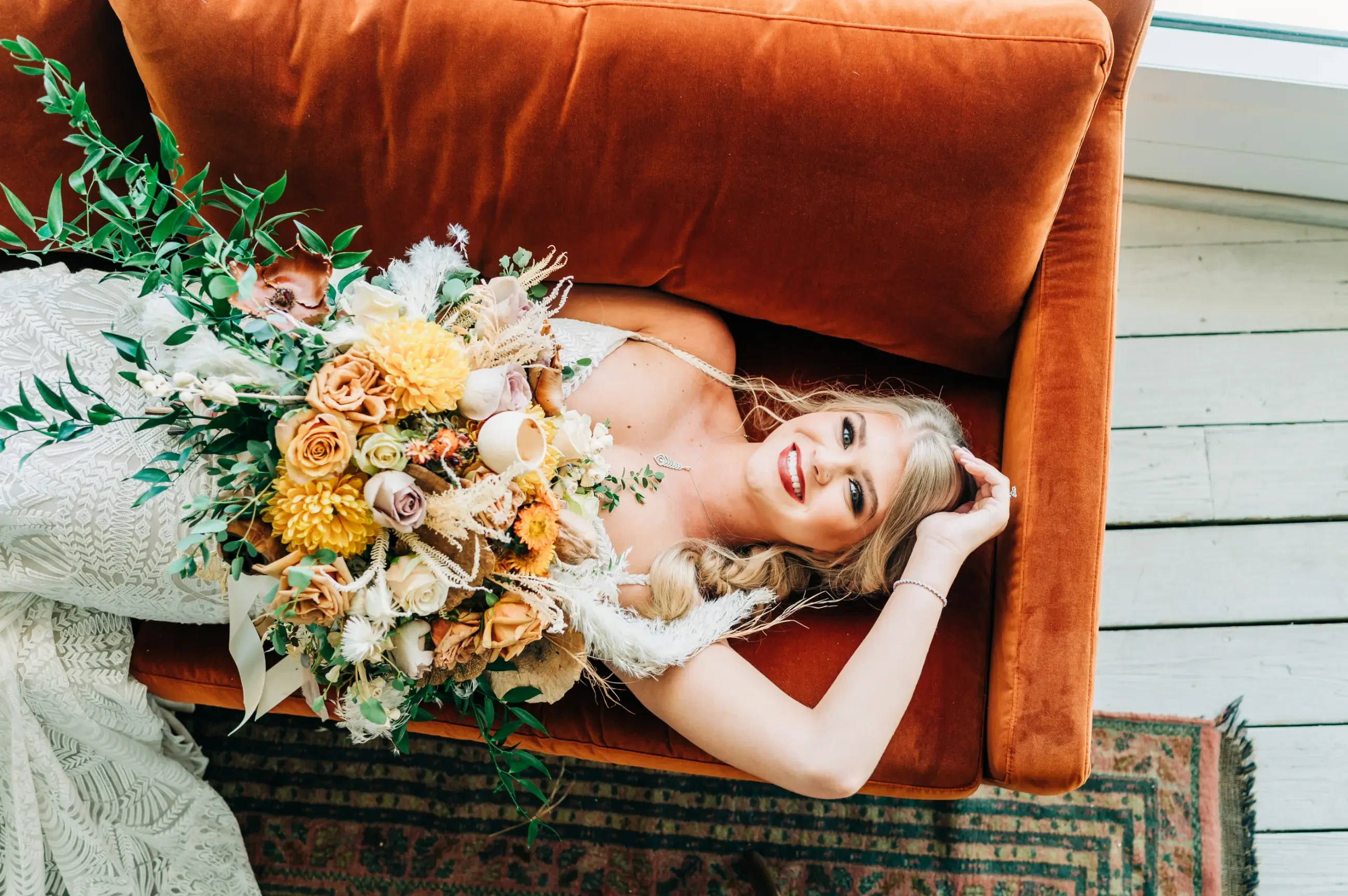 image shows a model wearing a wedding dress for a fall wedding