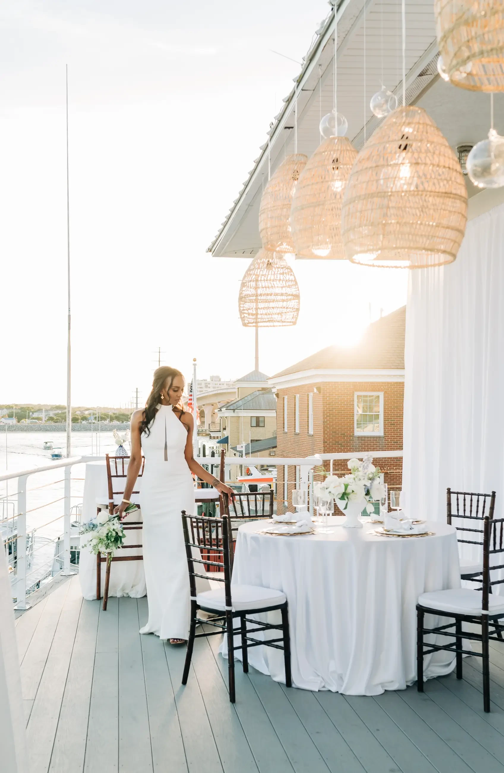 image shows a model wearing a summer wedding dress