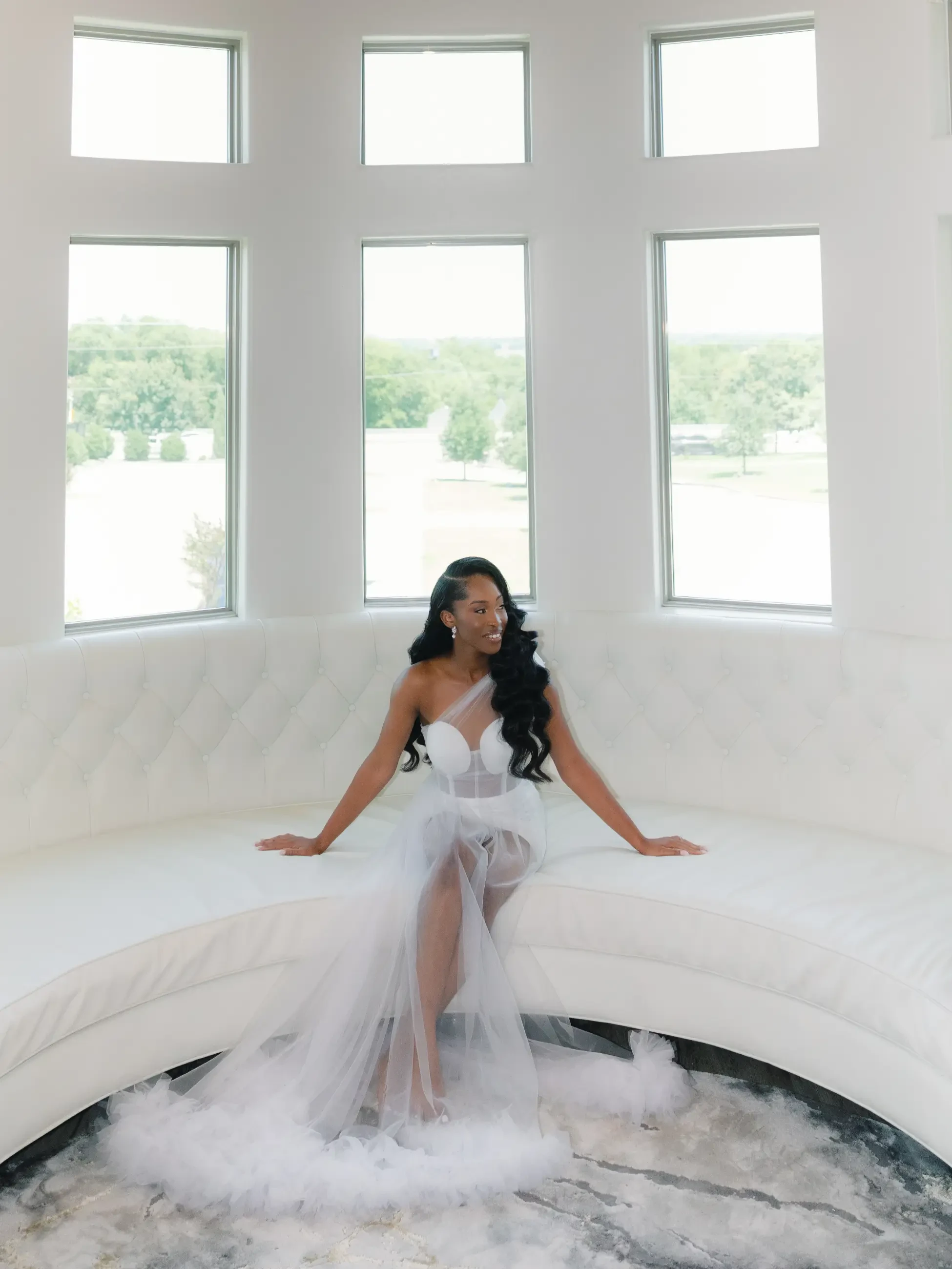 image shows Jonathlyn Agyemang in her ball gown wedding dress