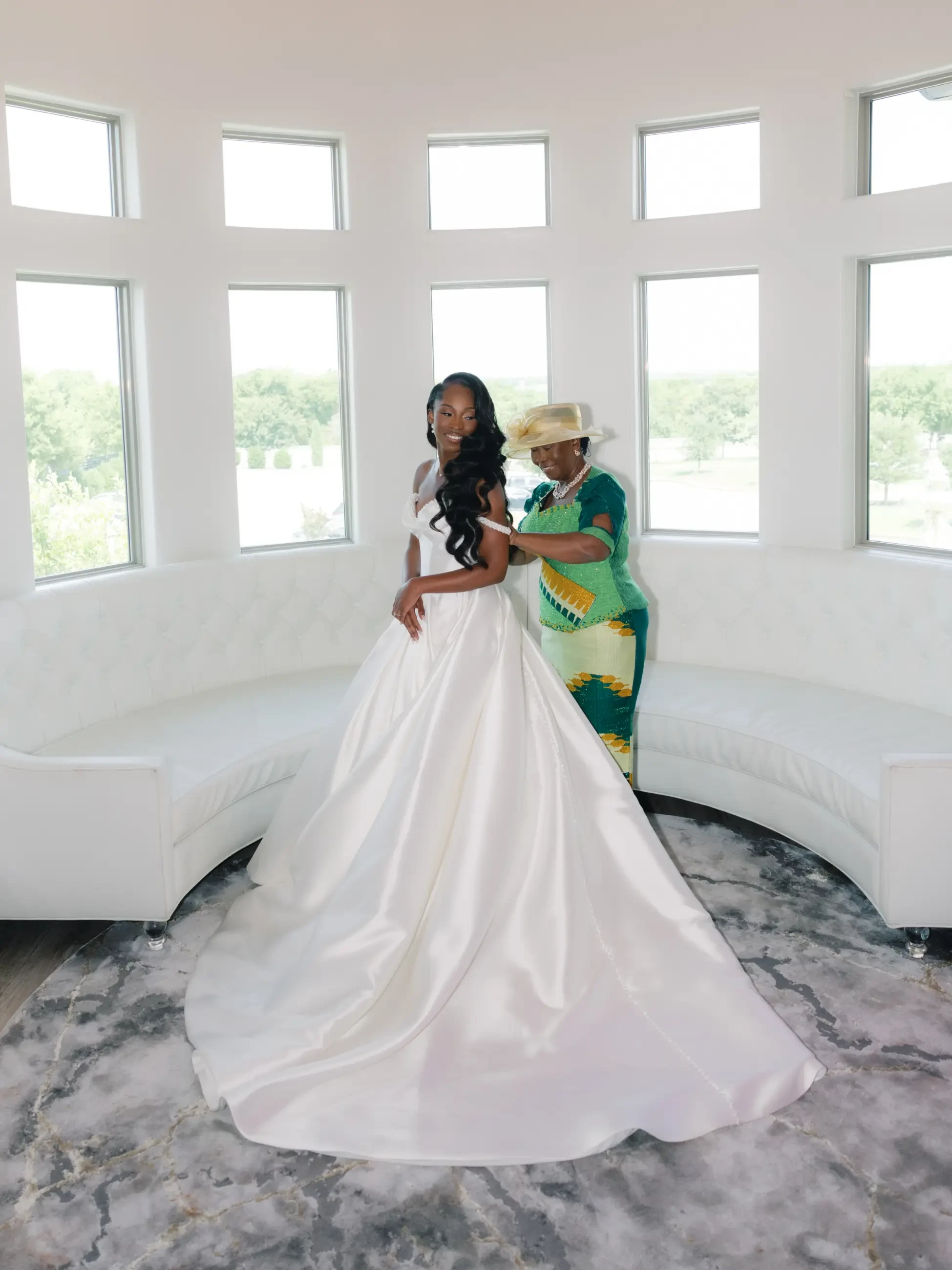 image shows Jonathlyn Agyemang in her ball gown wedding dress