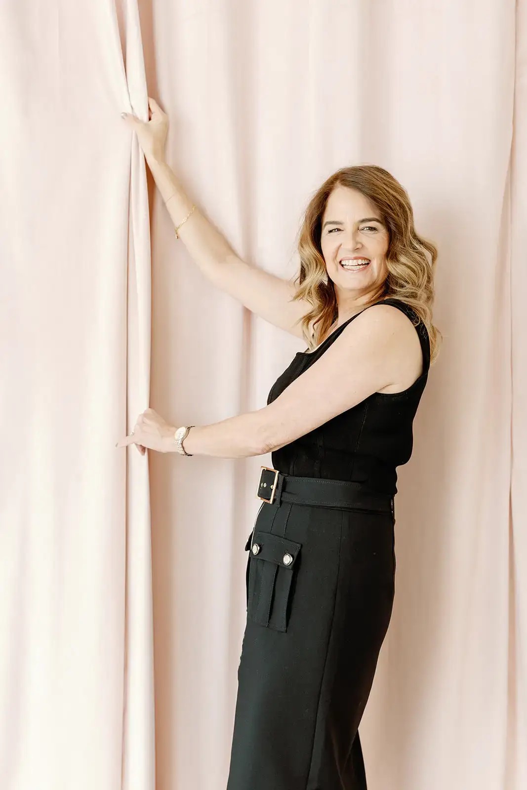 image shows bridal consultant stacie smiling 