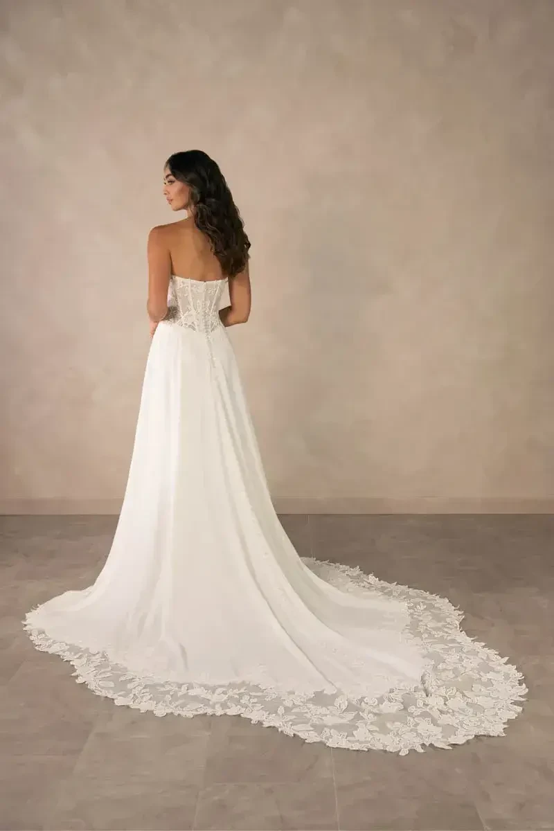 model is wearing a strapless a-line bridal gown