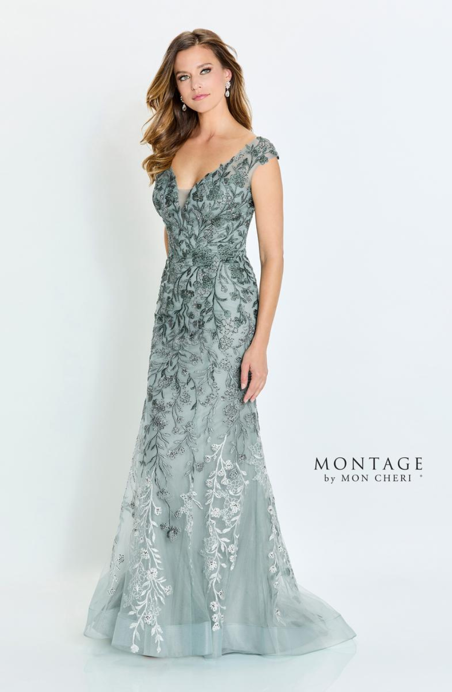 model is wearing an ombre cap sleeve mother of the bride dress