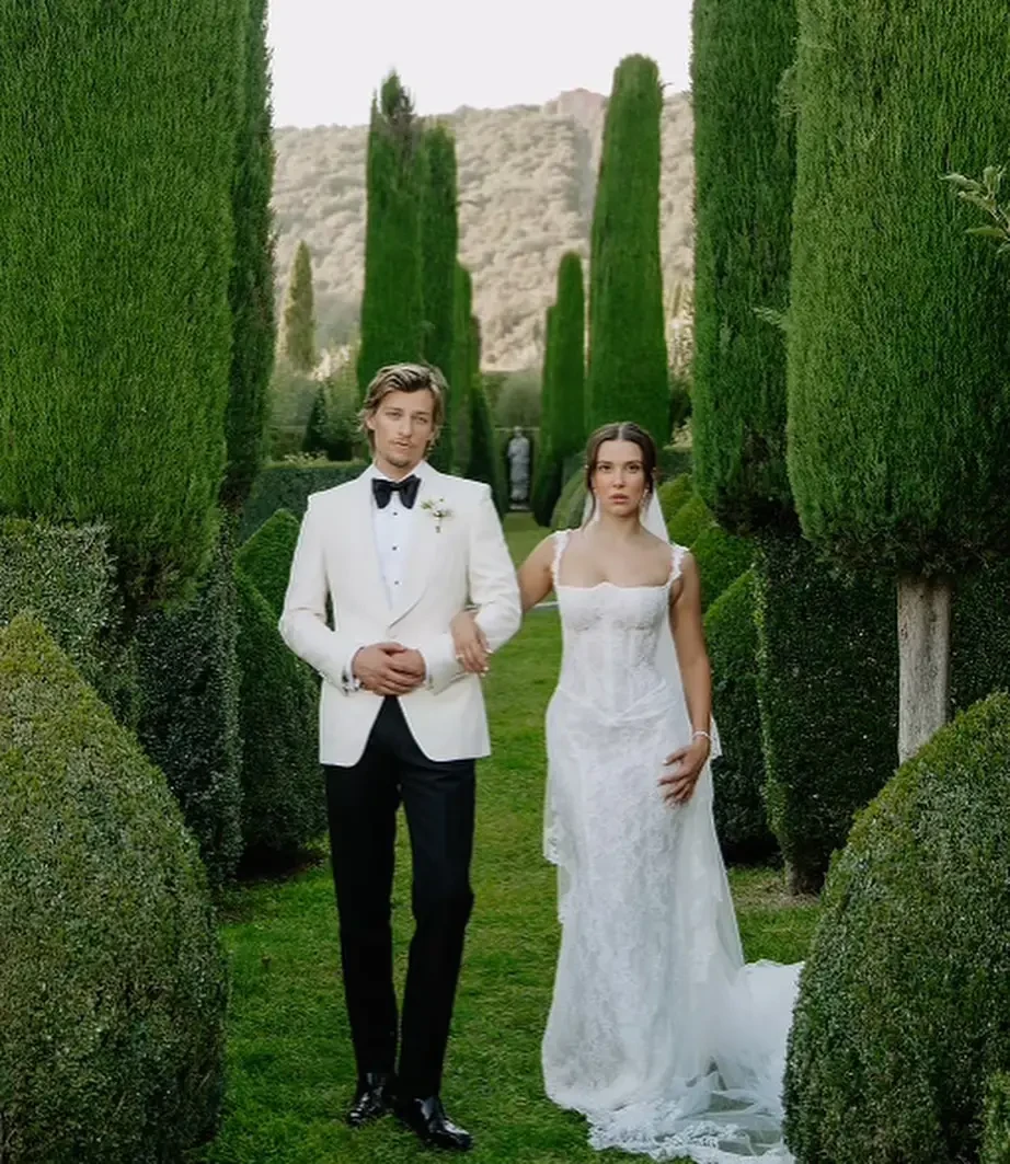 image shows millie bobby brown and her husband on their wedding day