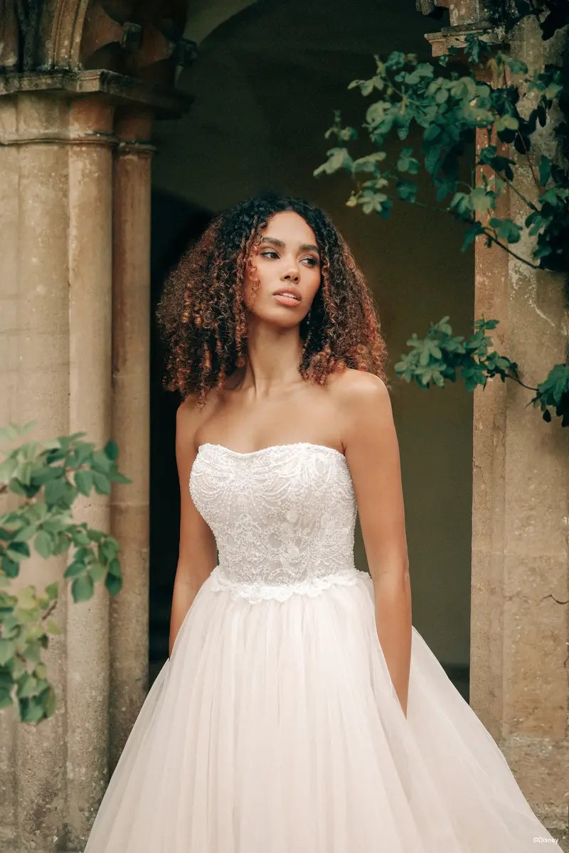 Model wearing a white gown