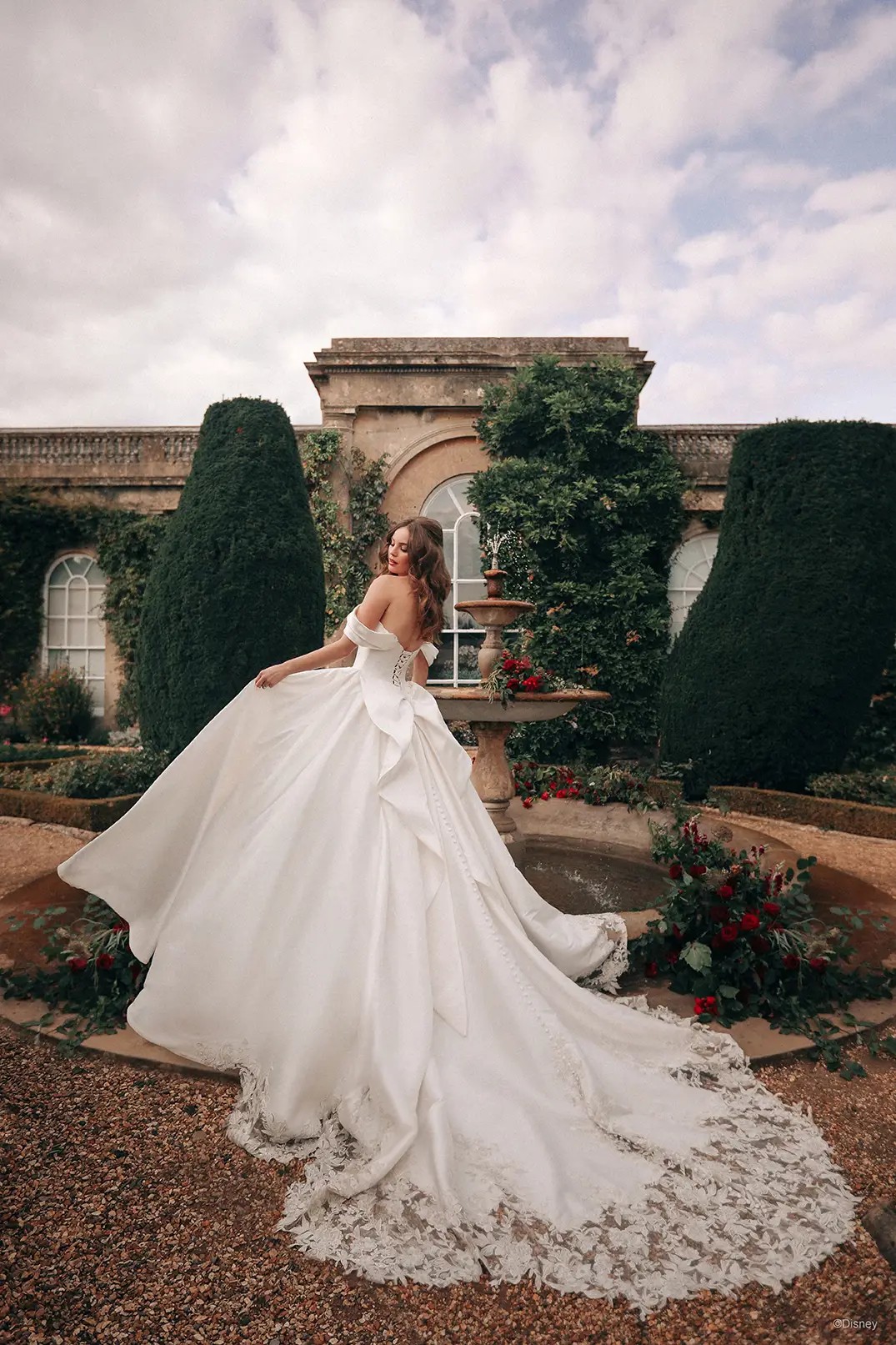 Model wearing a white gown 5